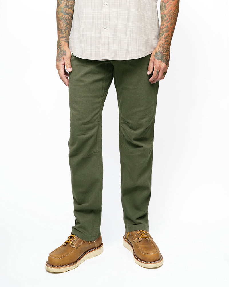 Men's dark olive taper-fit pants, full-length view with tapered leg openings