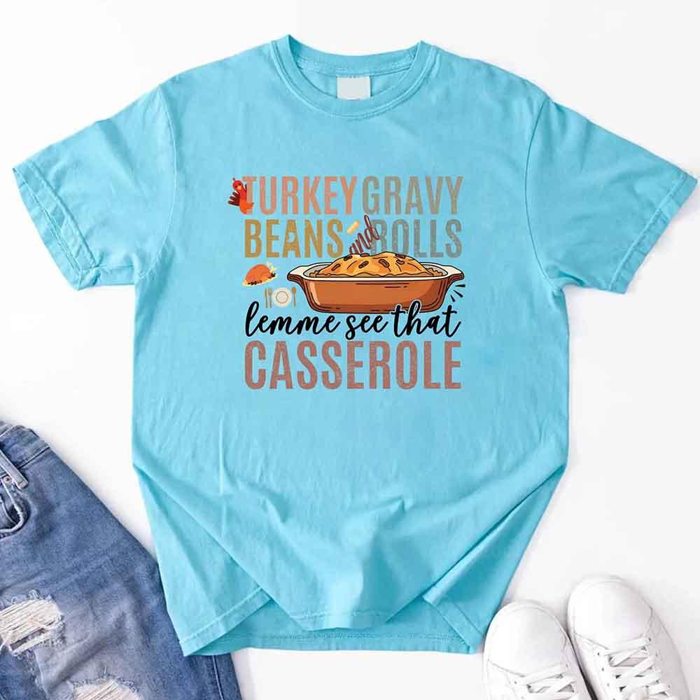 Light blue crewneck T-shirt with colorful turkey-gravy casserole graphic on front