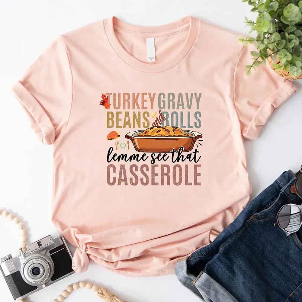 Peach graphic T-shirt with Turkey gravy beans and rolls casserole front print