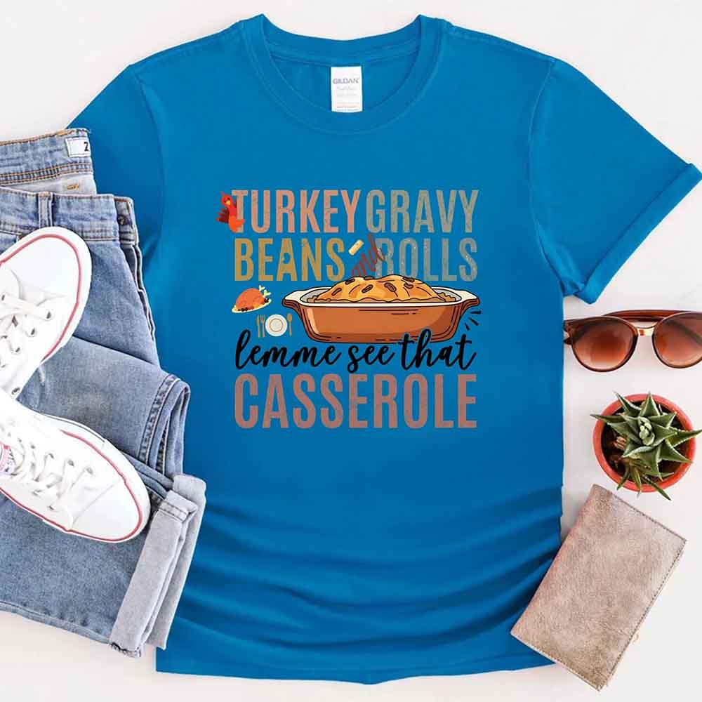 Blue crewneck T-shirt with colorful turkey-gravy casserole graphic on front