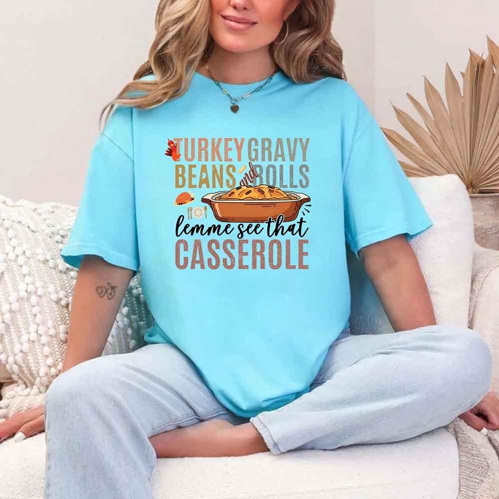 Light blue graphic T-shirt with Turkey gravy beans and rolls casserole front print