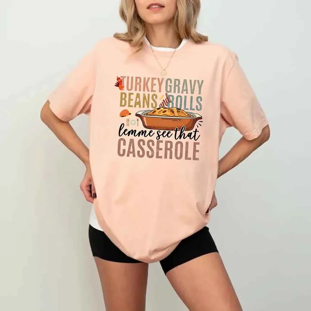 Peach crewneck T-shirt with colorful Thanksgiving casserole graphic