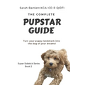 Paperback book: The Complete PupStar Guide with puppy cover photo and title text.