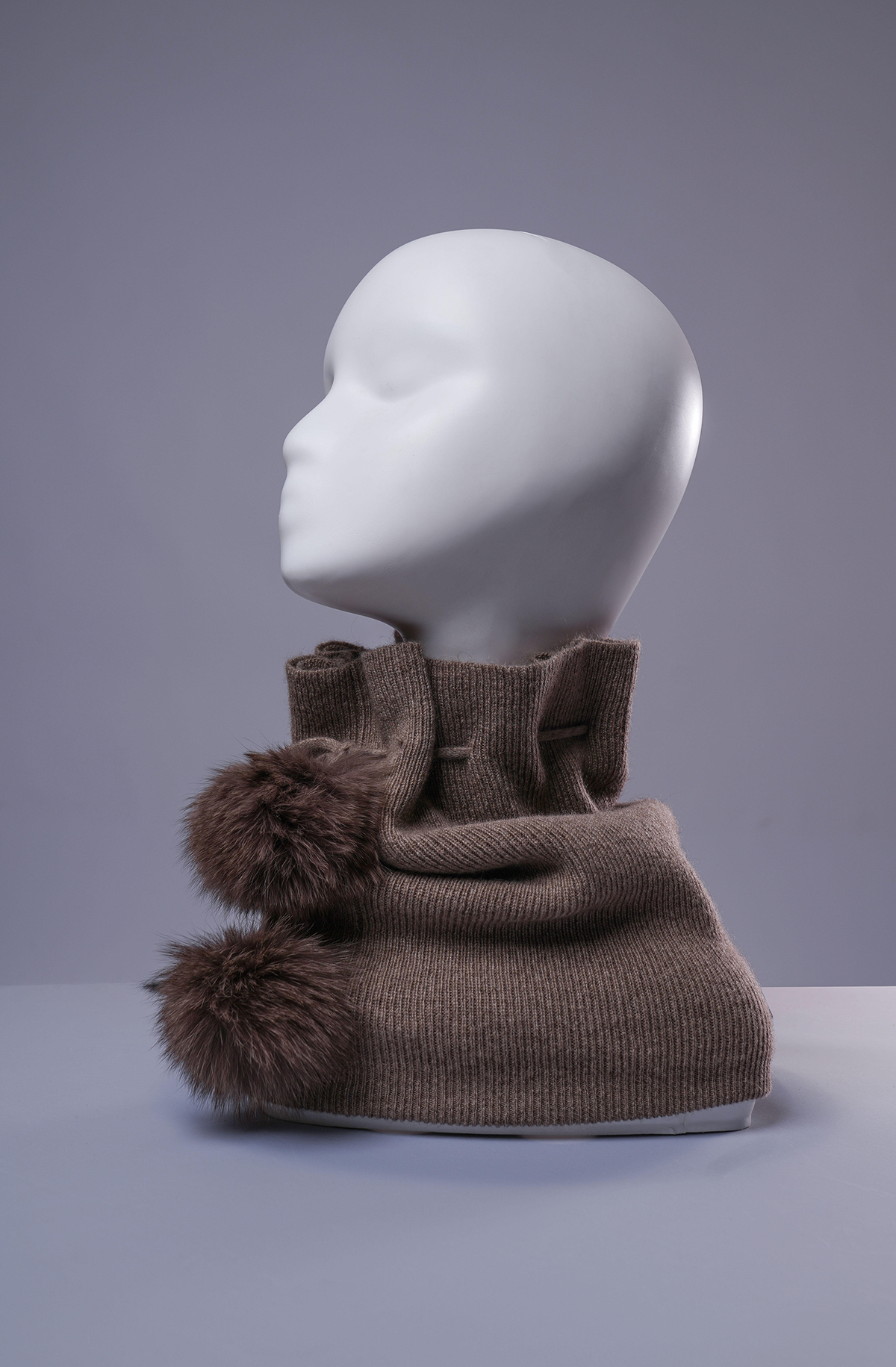 Brown cashmere neck warmer and beanie with fur pom-pom accents