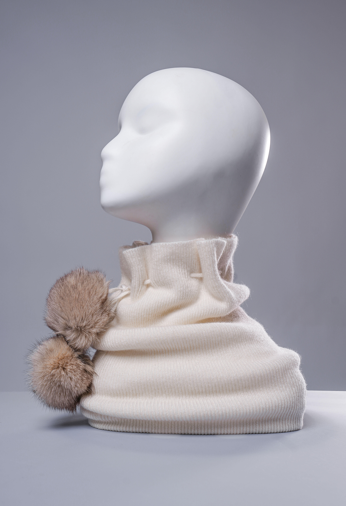 Winter white cashmere neck warmer and beanie with two fur pom-poms