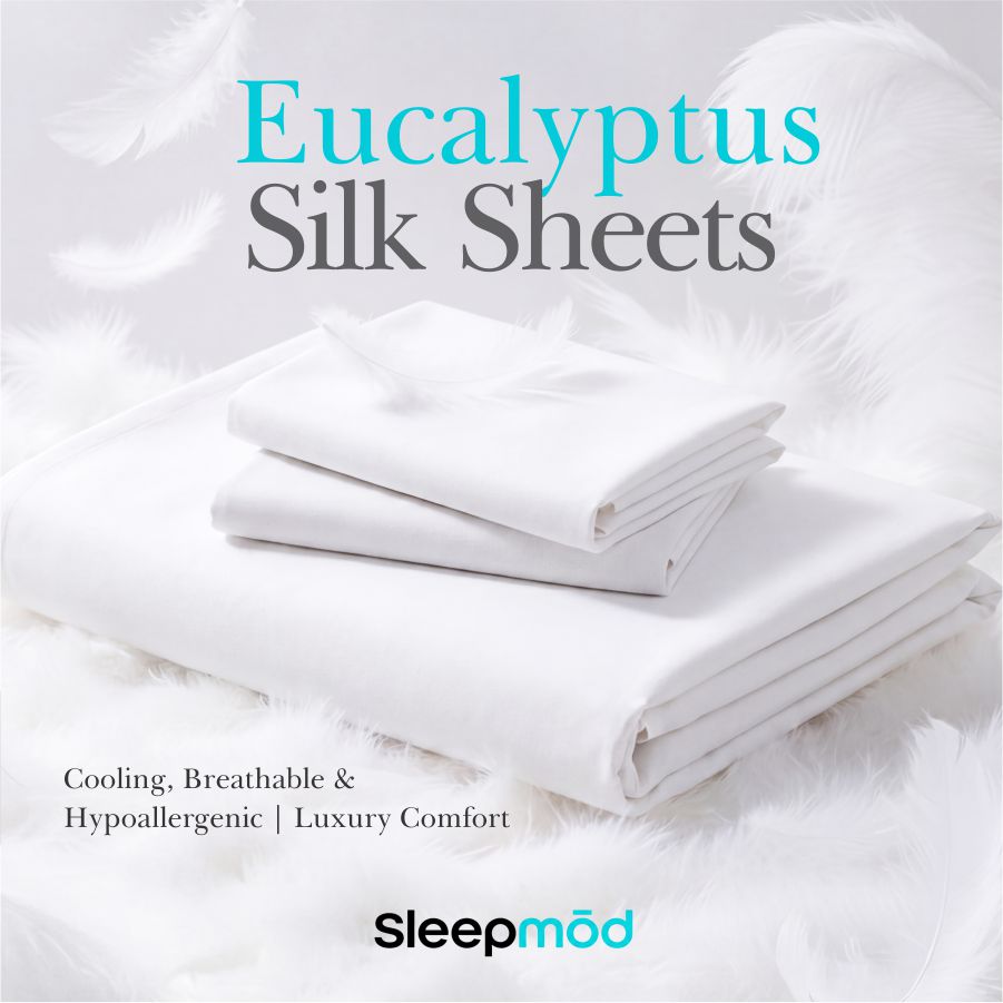 Eucalyptus Tencel sheet set, folded white sheets neatly stacked.