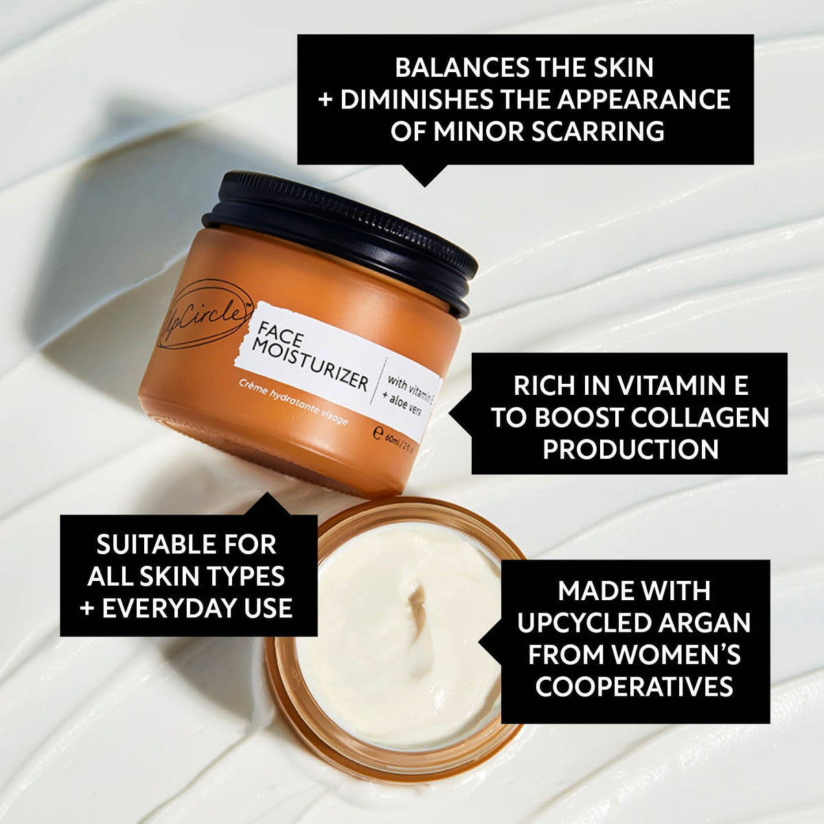 Amber face moisturizer jar with black lid and open cream inside