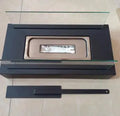 Black mini alcohol fireplace with clear glass window and burner tube