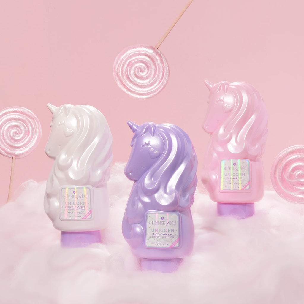 Pink, white, and purple unicorn-shaped bottles with heart emblem on the front