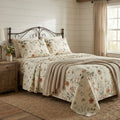 Floral microfiber sheet set with pillowcases on a bed, botanical print in warm tones