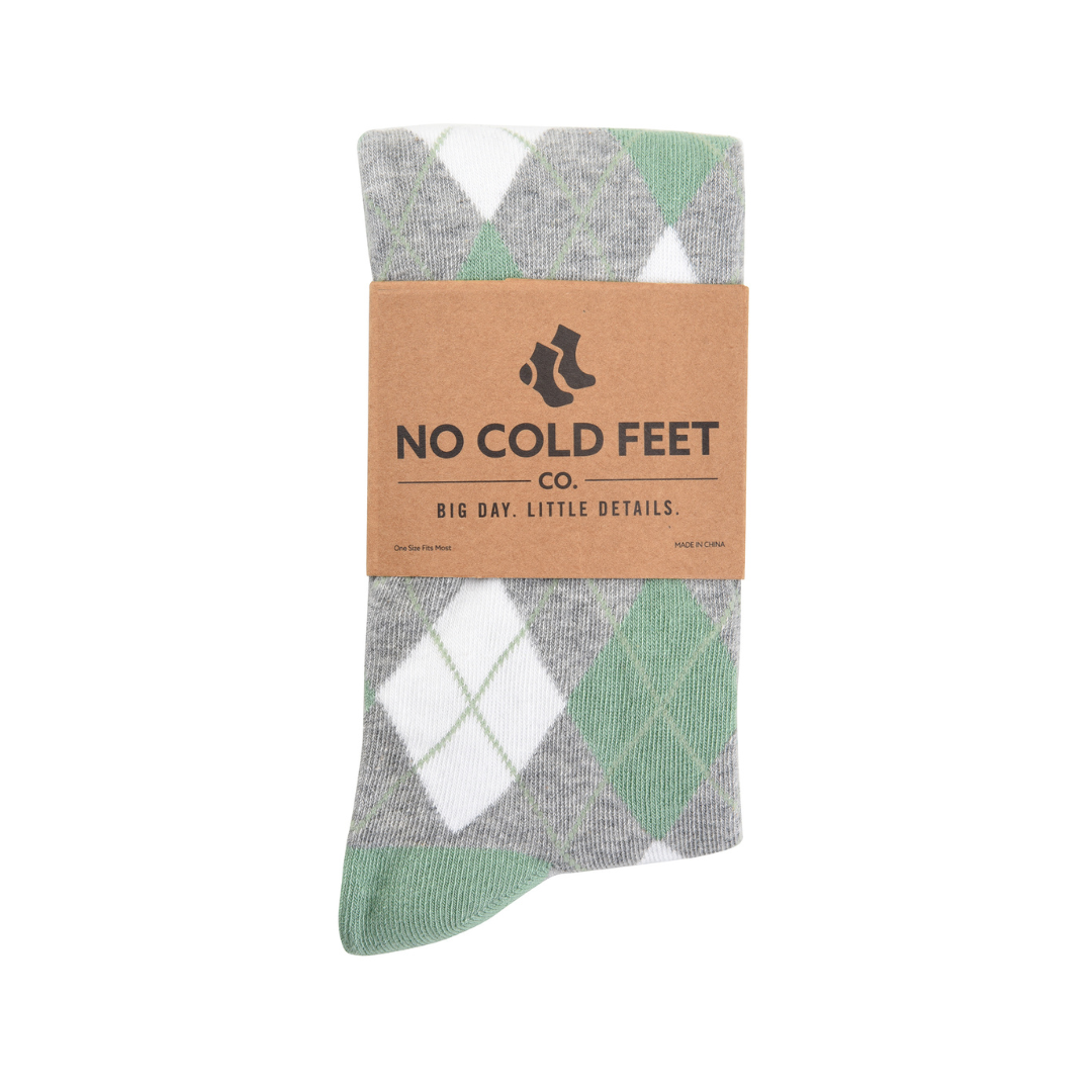 Gray and sage green argyle socks with “No Cold Feet Co.” label band