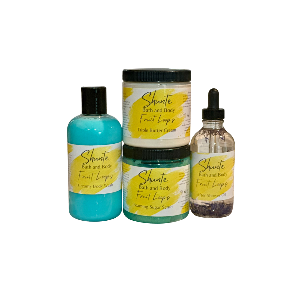 Bath and body gift set bundle with fruit lippy: teal bottle, green jar, and oil bottle.