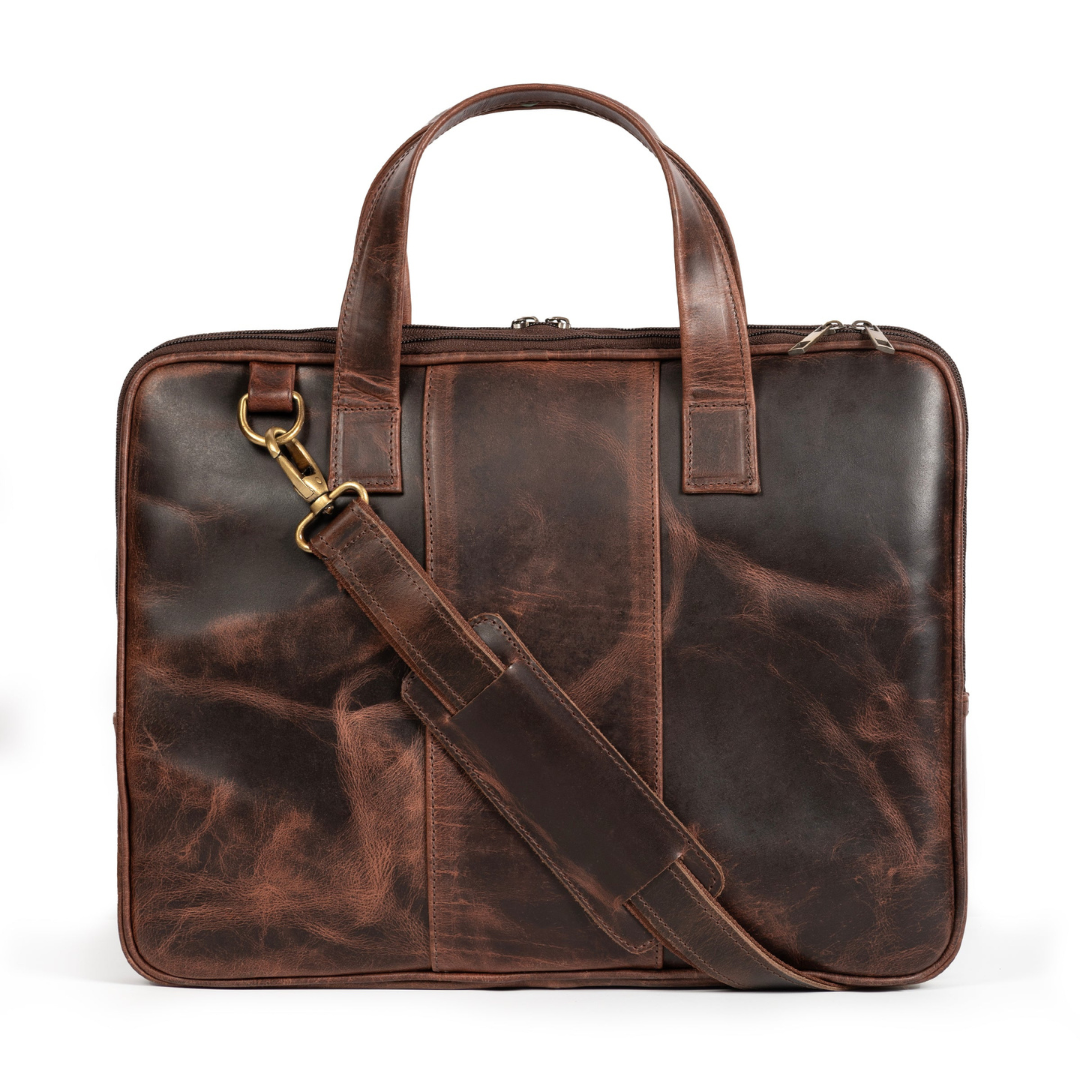 Brown leather laptop briefcase with top handle and front panel strap detail