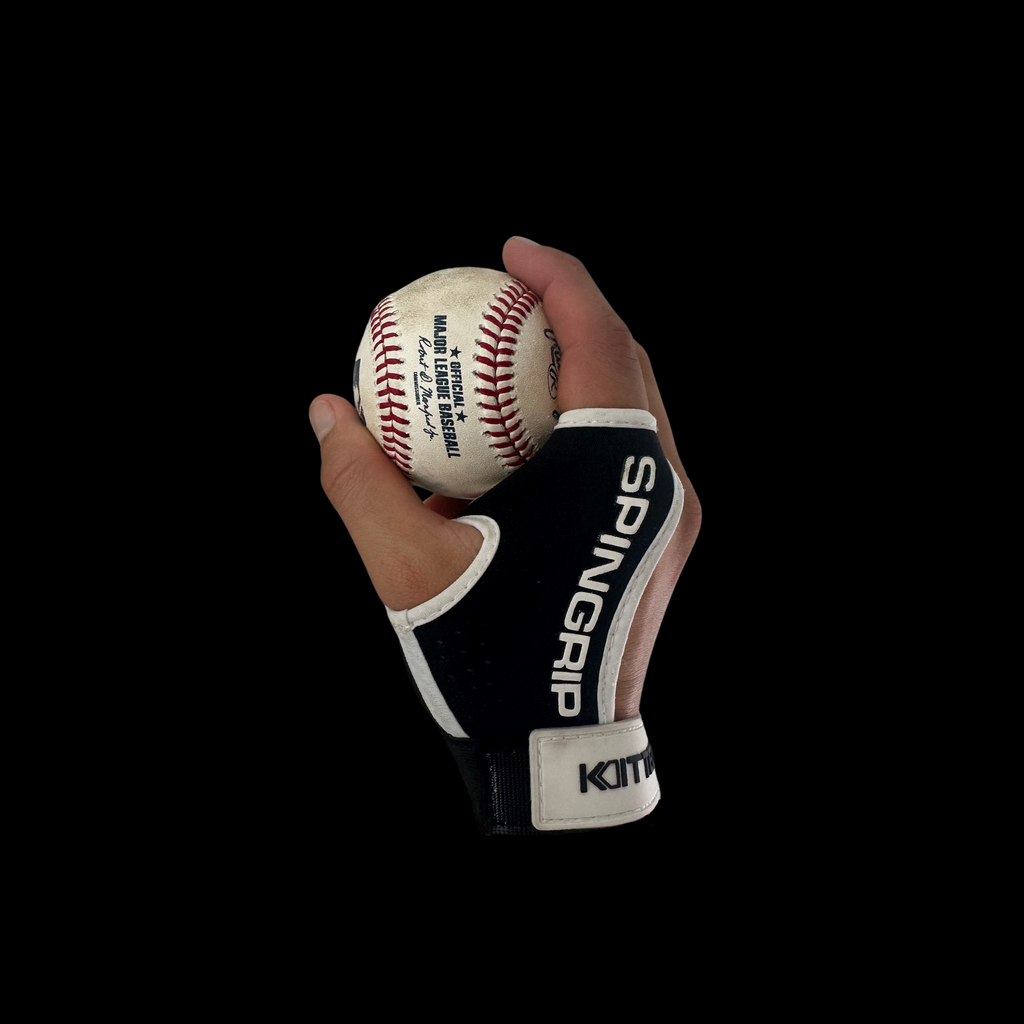 Baseball spin-grip training glove holding a white baseball with red stitches