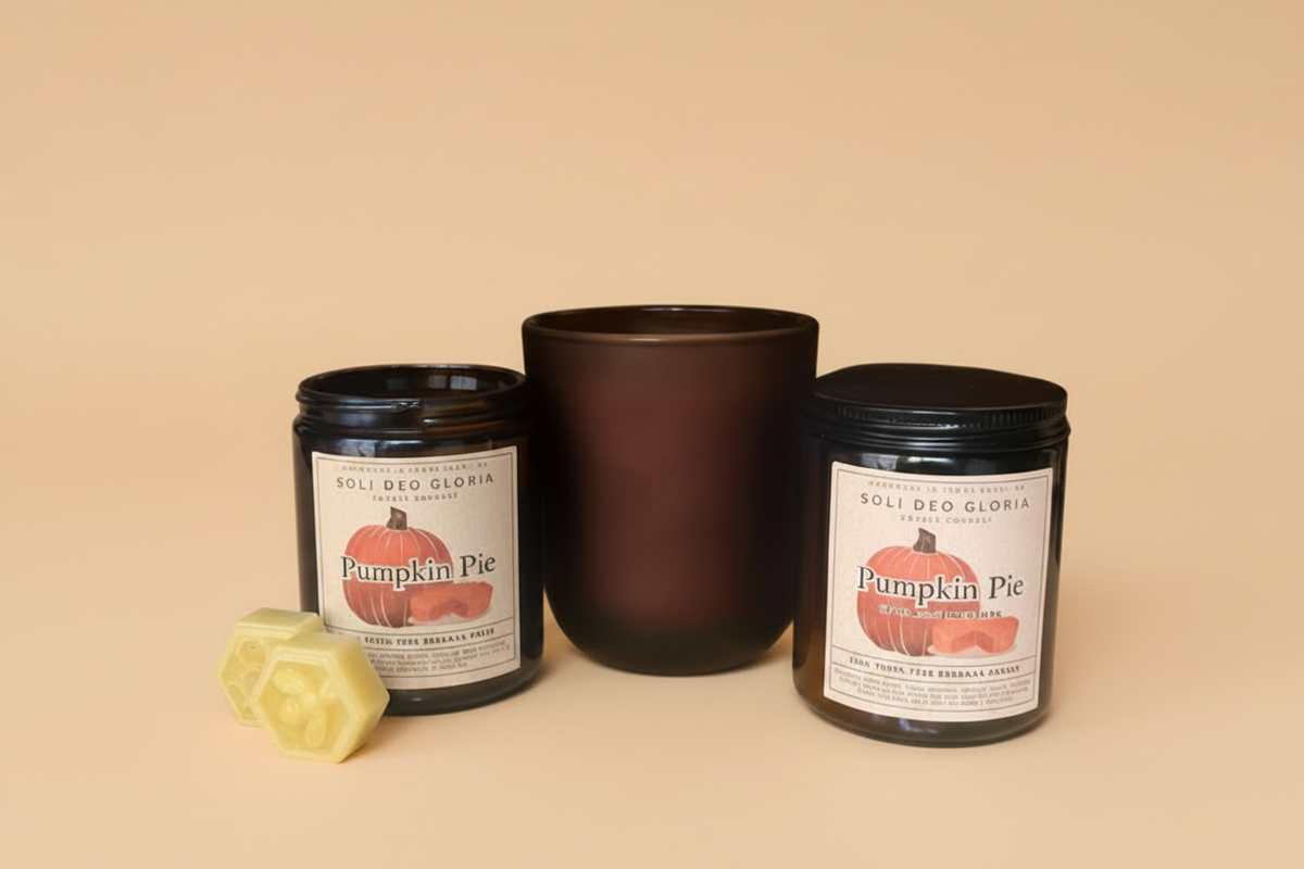 Beeswax candle set with two dark tins and one matte brown jar plus wax cube.