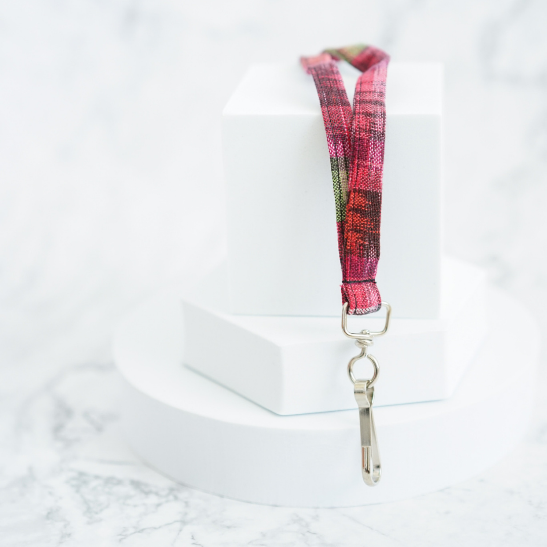 Pink patterned lanyard with metal clip and keyring keys