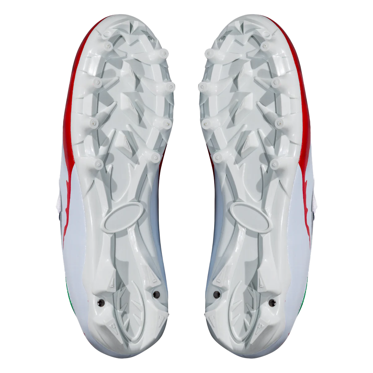 Underside of white soccer cleats with molded traction studs and red trim