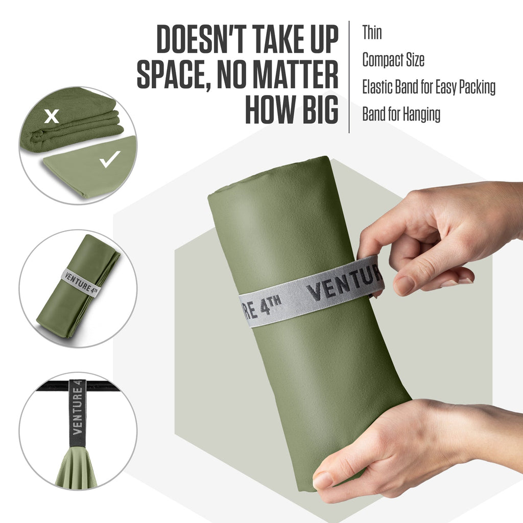 Olive green microfiber towel rolled and secured with elastic band