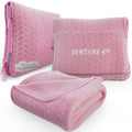 Pink quilted travel blanket and matching pillow case with zippered pouch