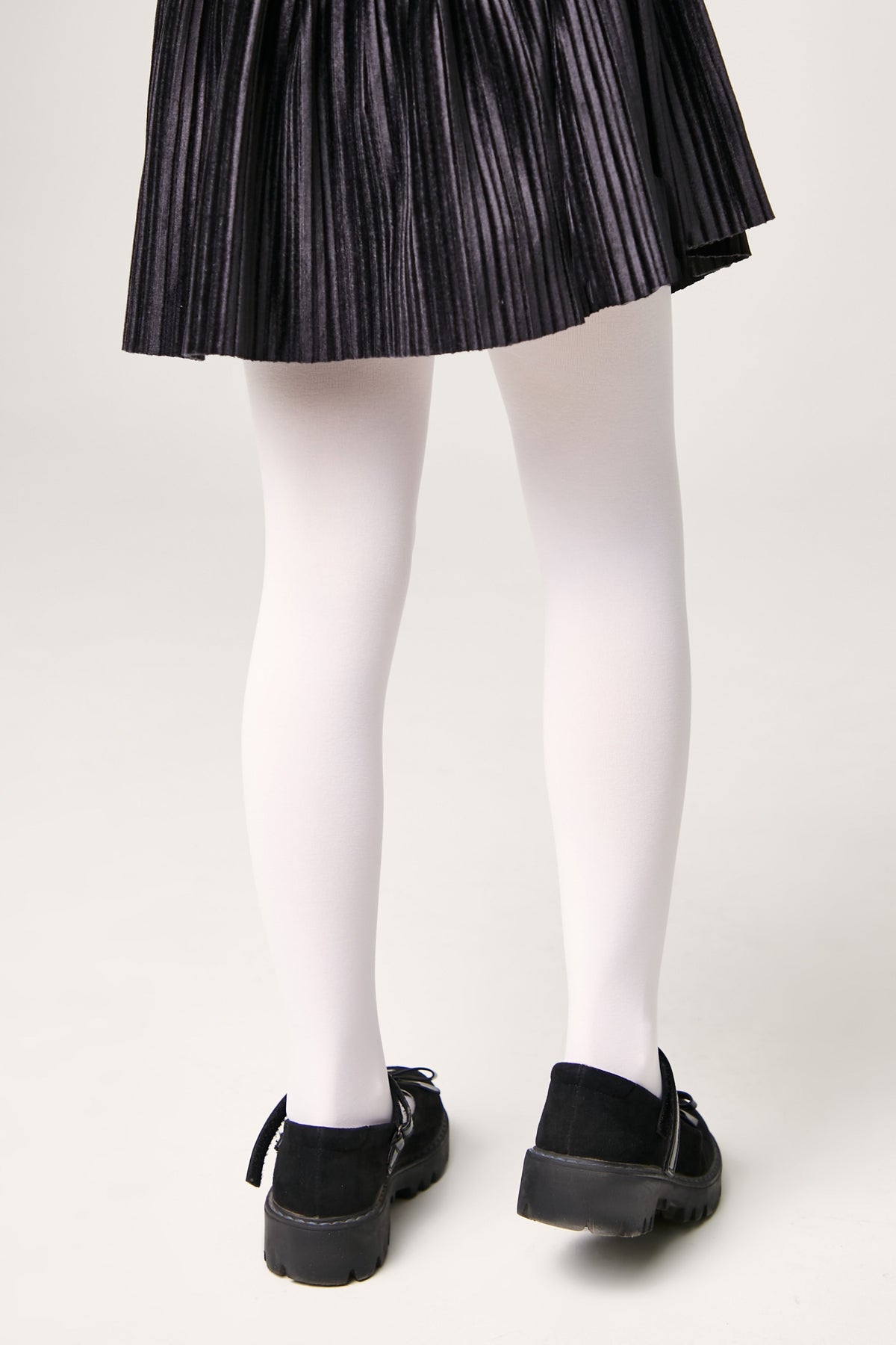 Girls 60 den velour tights in light color, full legs with smooth velour finish