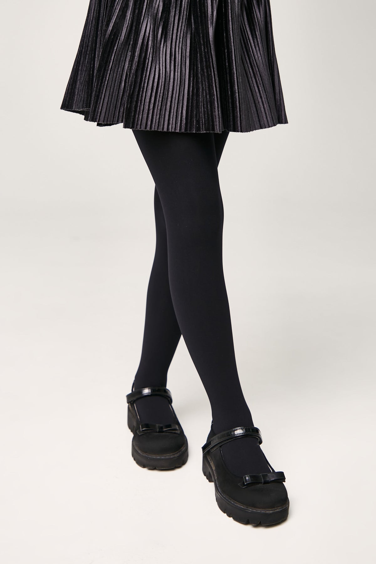Black girls velour 60 den tights, lower-leg view with matching shoes