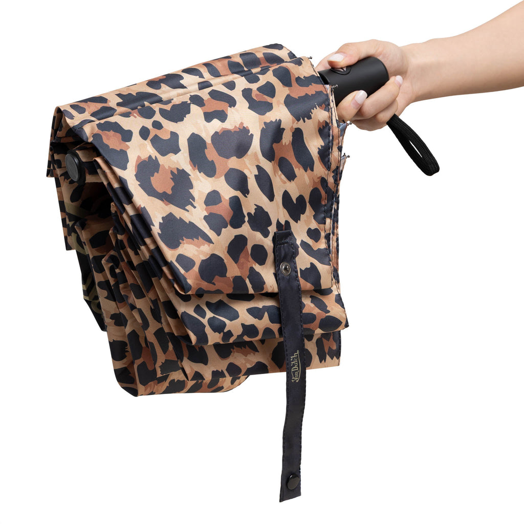 Folded compact umbrella with leopard print, Von Dutch logo, black strap and handle