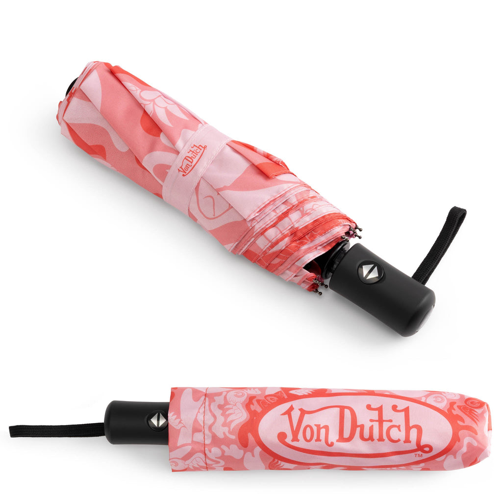 Pink camo compact umbrella closed, with black strap and matching sleeve