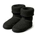 Women's black fuzzy ankle booties with thick cuff and rubber sole