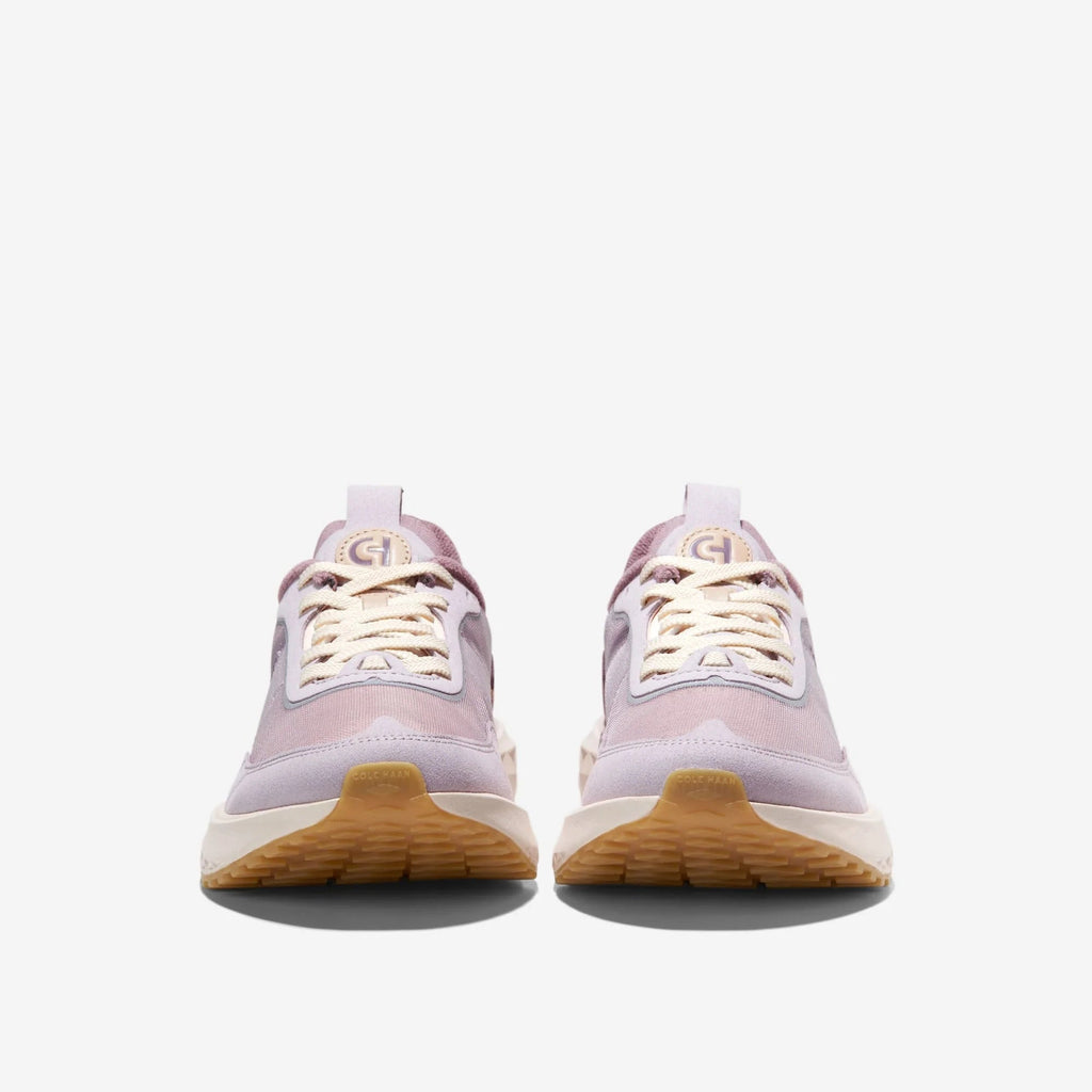 Women's low-top sneakers back view in mauve and lavender with cushioned heel.
