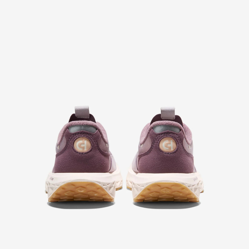 Women's low-top sneakers with rear heel tab and embossed logo in mauve.