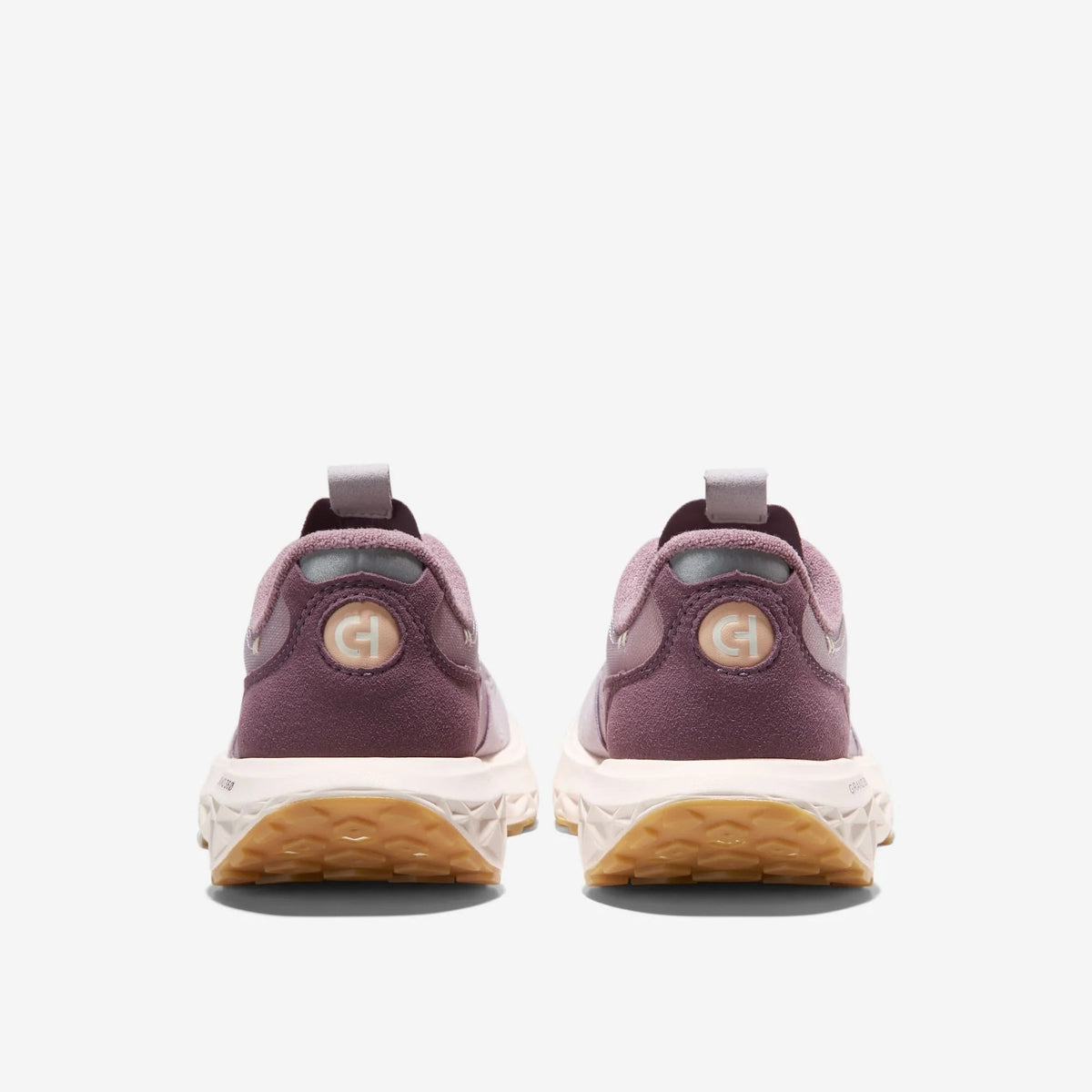 Women's low-top sneakers with rear heel tab and embossed logo in mauve.