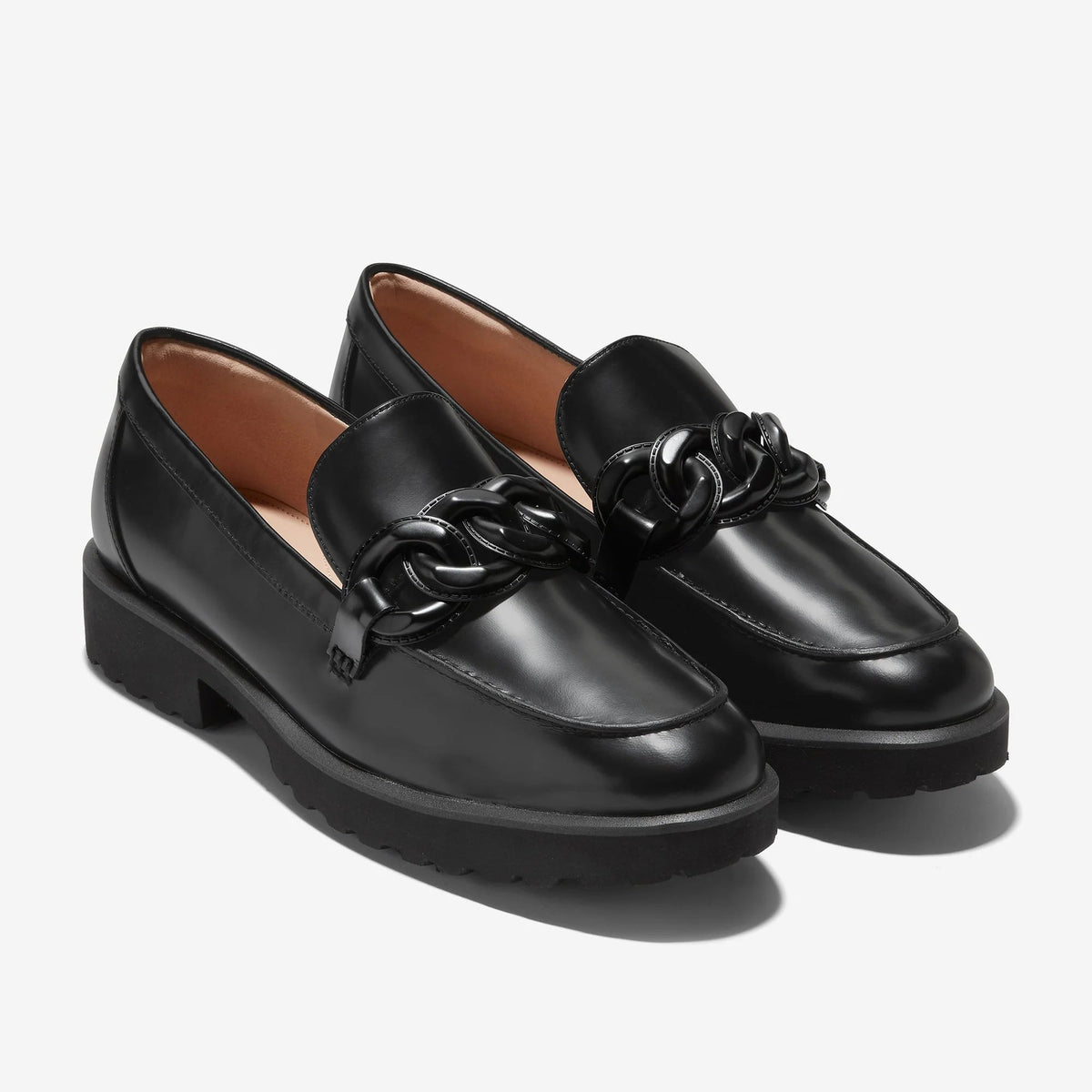 Women’s Cole Haan chain loafers, black leather with braided-chain ornament and block heel