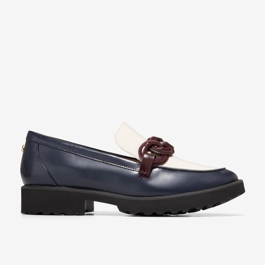 Women's navy loafer with white vamp panel, burgundy chain detail, chunky outsole