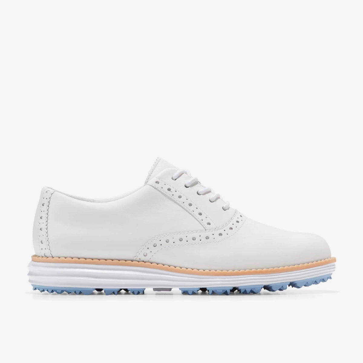 Women's white waterproof golf oxford shoe with perforated wingtip and blue tread sole