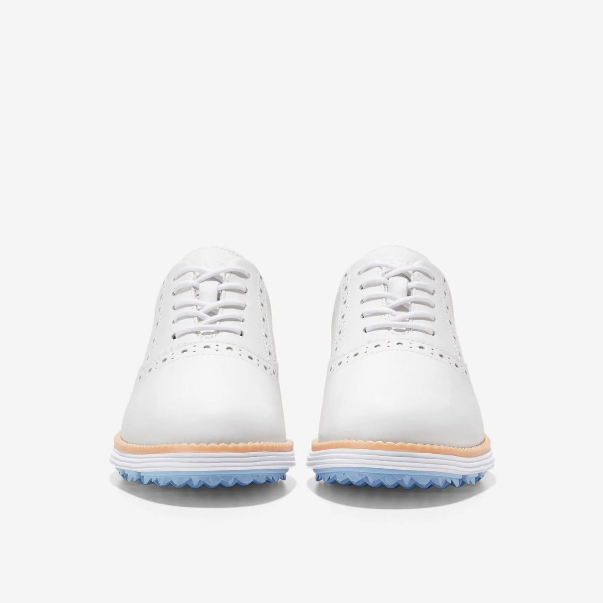 Pair of white oxford golf shoes with lace-up back and blue rubber outsole