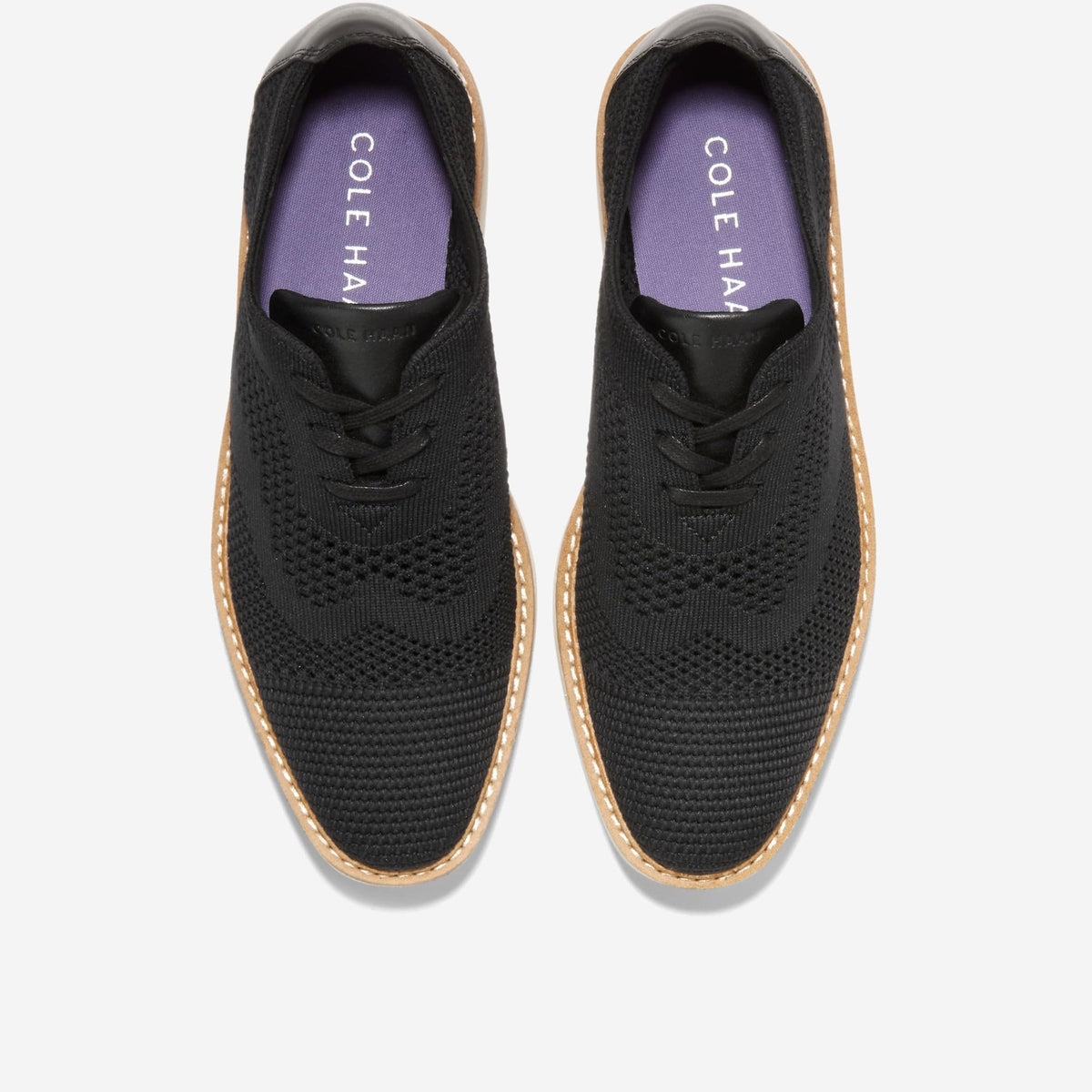 Black knit lace-up Oxford showing 'COLE HAAN' lining with cream contrast outsole