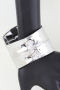 Women's silver-tone bracelet cuff with engraved motif and hinged clasp