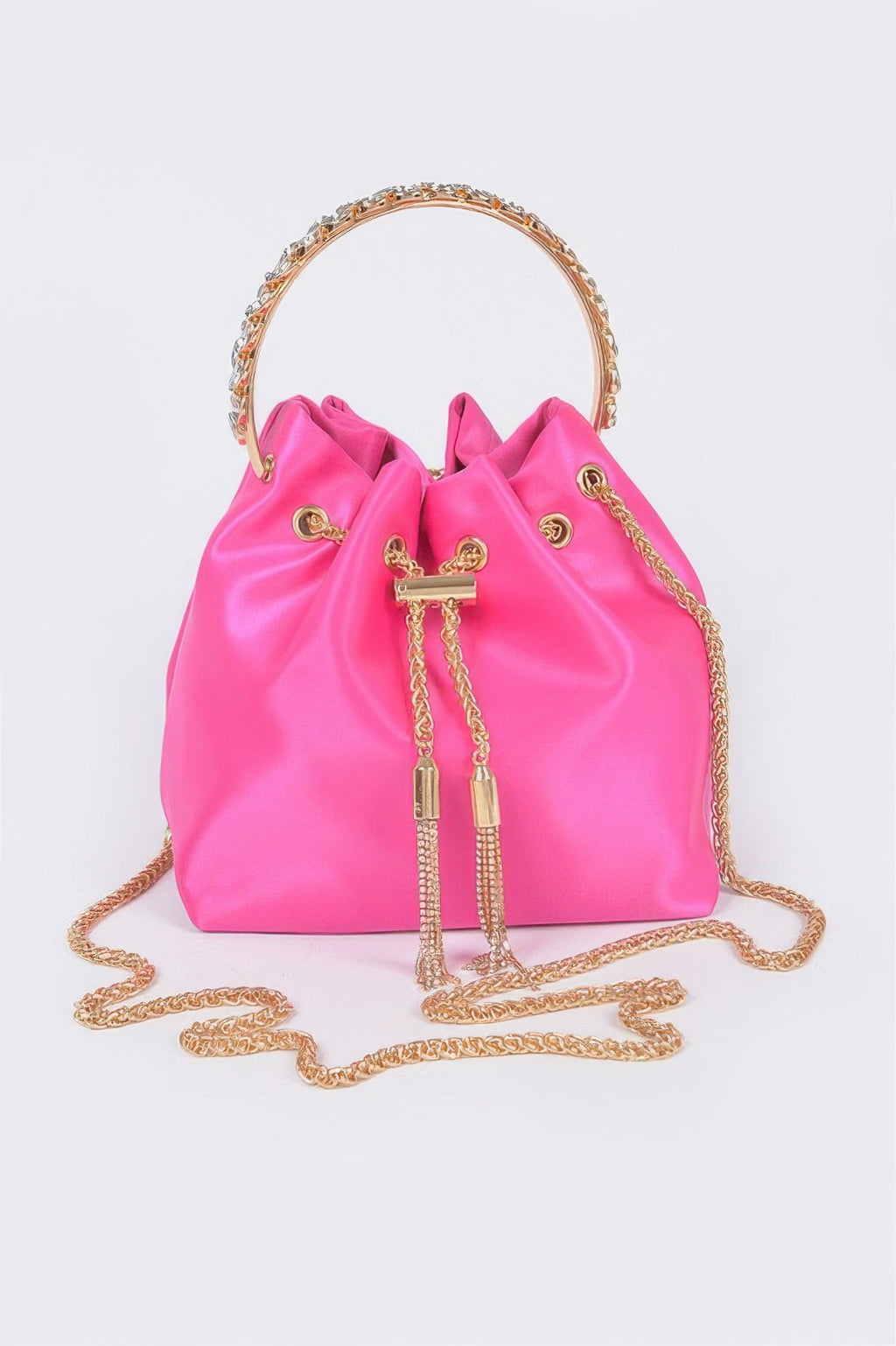 Fuchsia satin bucket bag with rhinestone top handle and gold chain straps