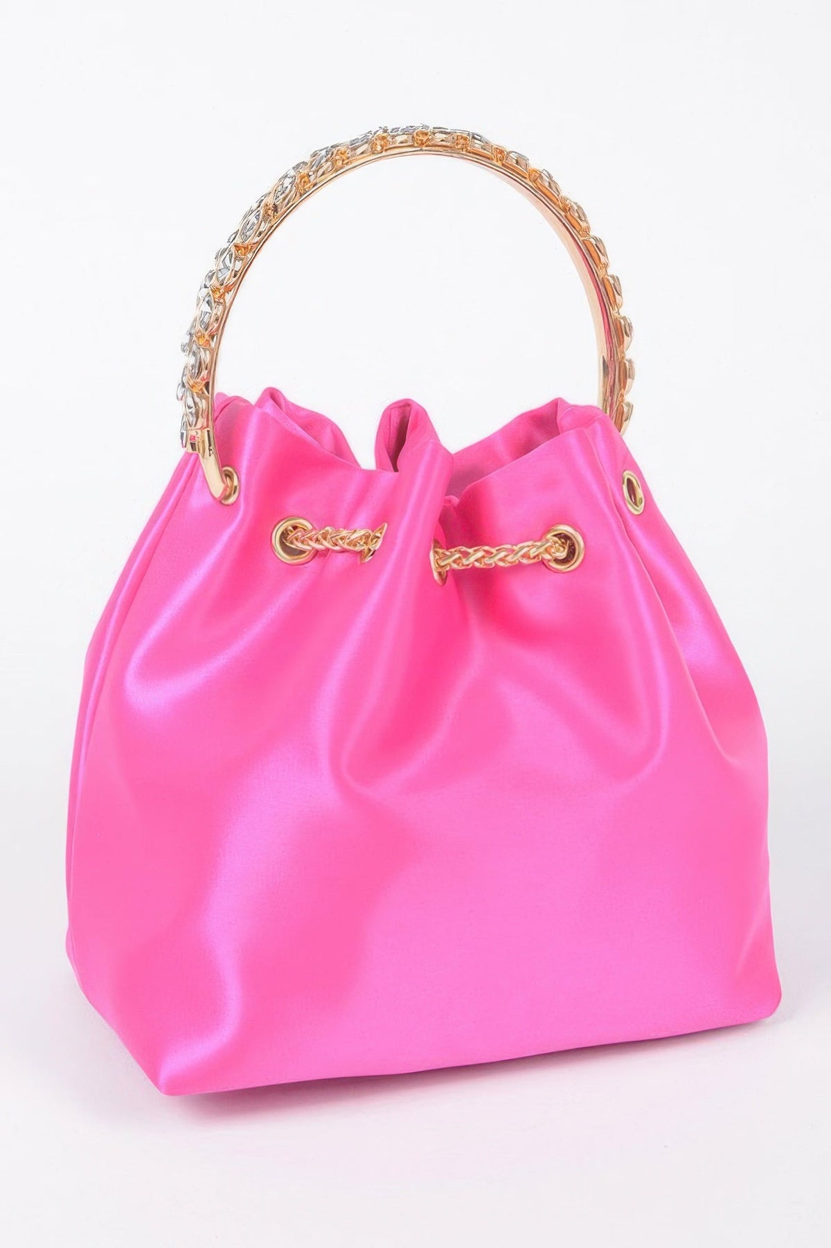 Fuchsia satin bucket bag with rhinestone handle, gold drawstring, and chain strap