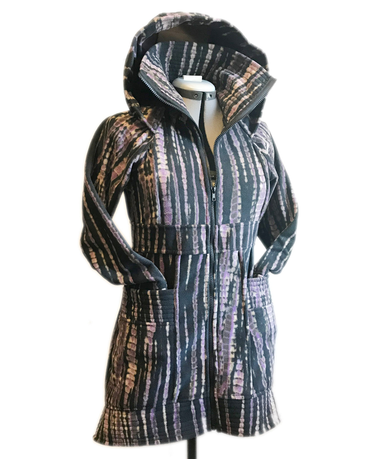 Fleece hooded sweater jacket on mannequin, dark multi-color vertical stripes, zip front