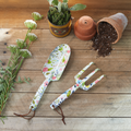 Floral printed gardening tool set with leaf-pattern handles and brown ties