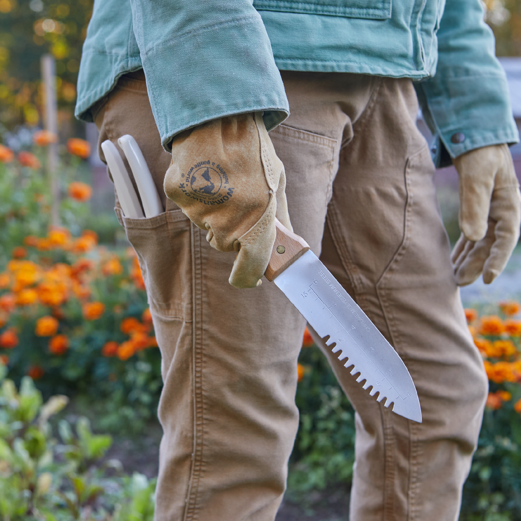 Hori Hori digging tool with serrated blade and wooden handle