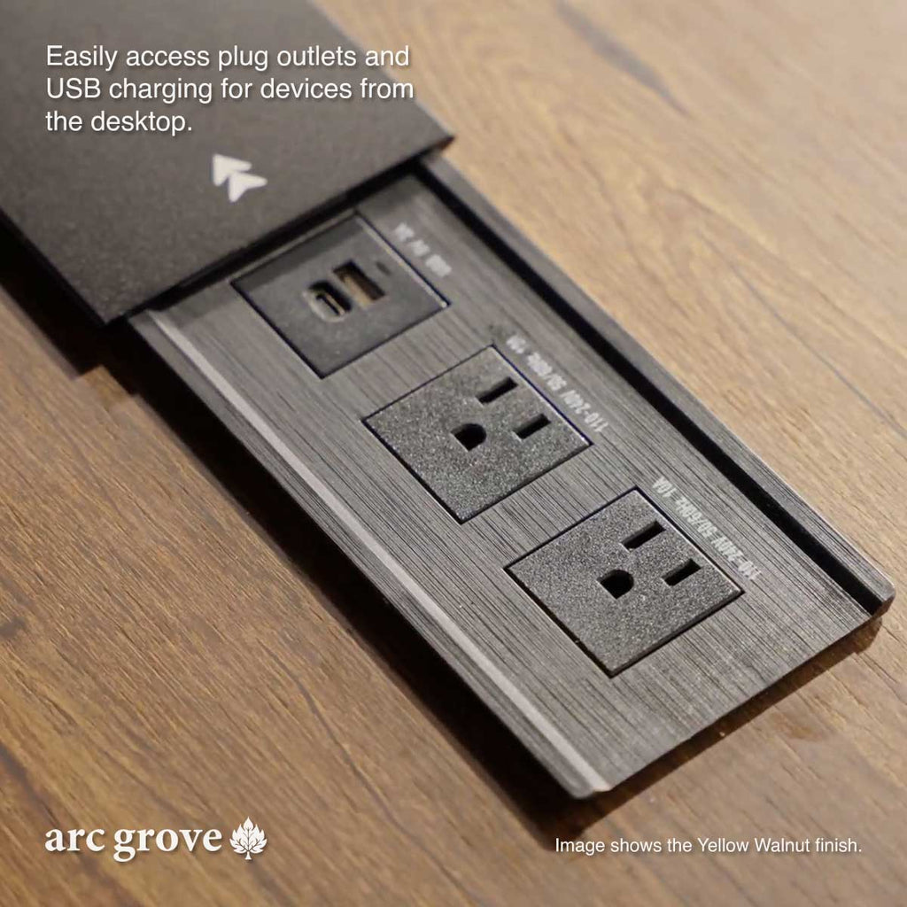 L-shaped executive desk power strip with USB and AC outlets on light wood surface