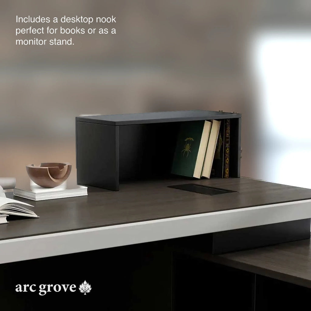 Dark modern desk with open lower storage space for books and decor.