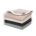 Baby terry washcloths, 4-pack stack in beige, light blue, charcoal, and gray