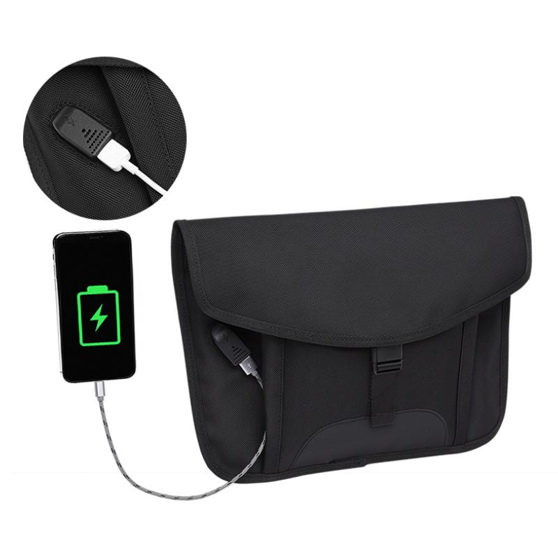 Black waterproof messenger bag with cable pass-through and charging port detail