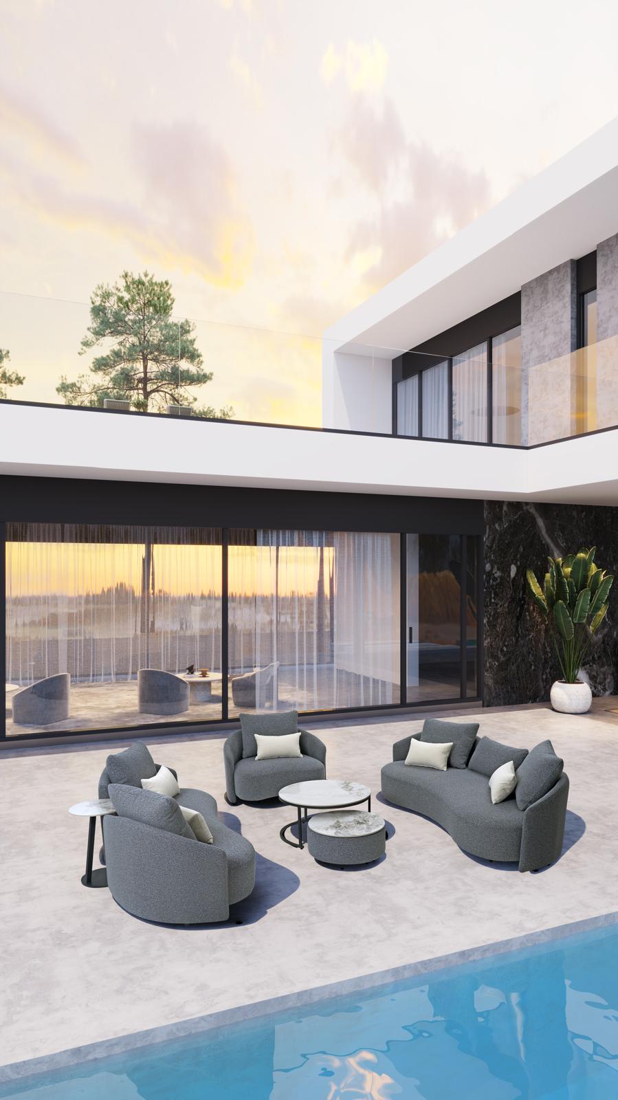 Gray outdoor lounge set with armchairs, small round tables, and cushioned sofa