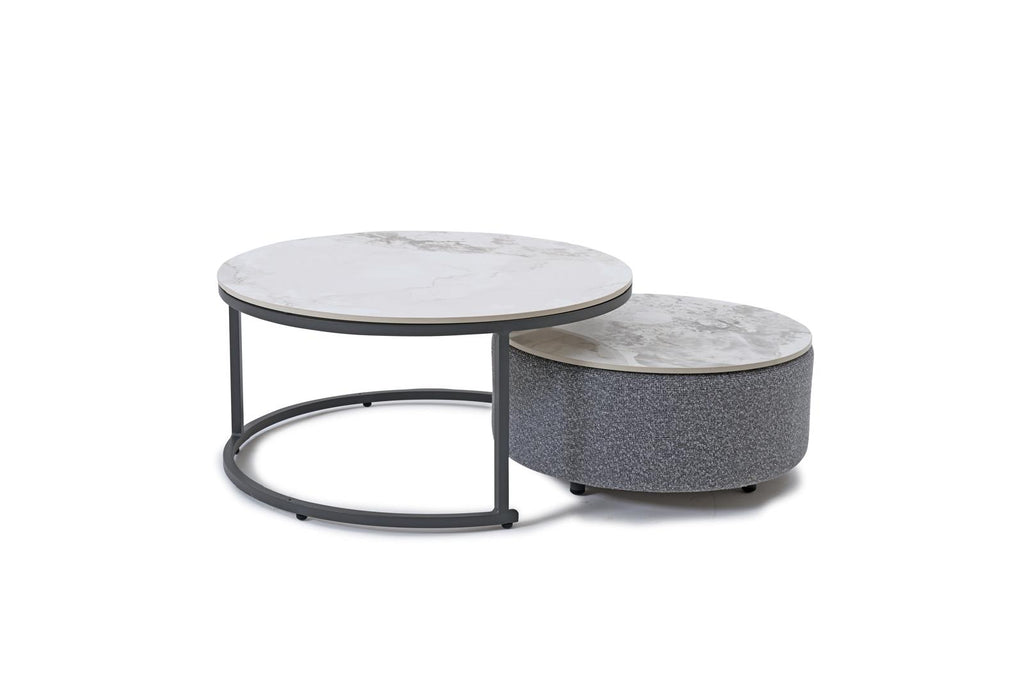 Outdoor round coffee table with marble-look top and gray ottoman-style side
