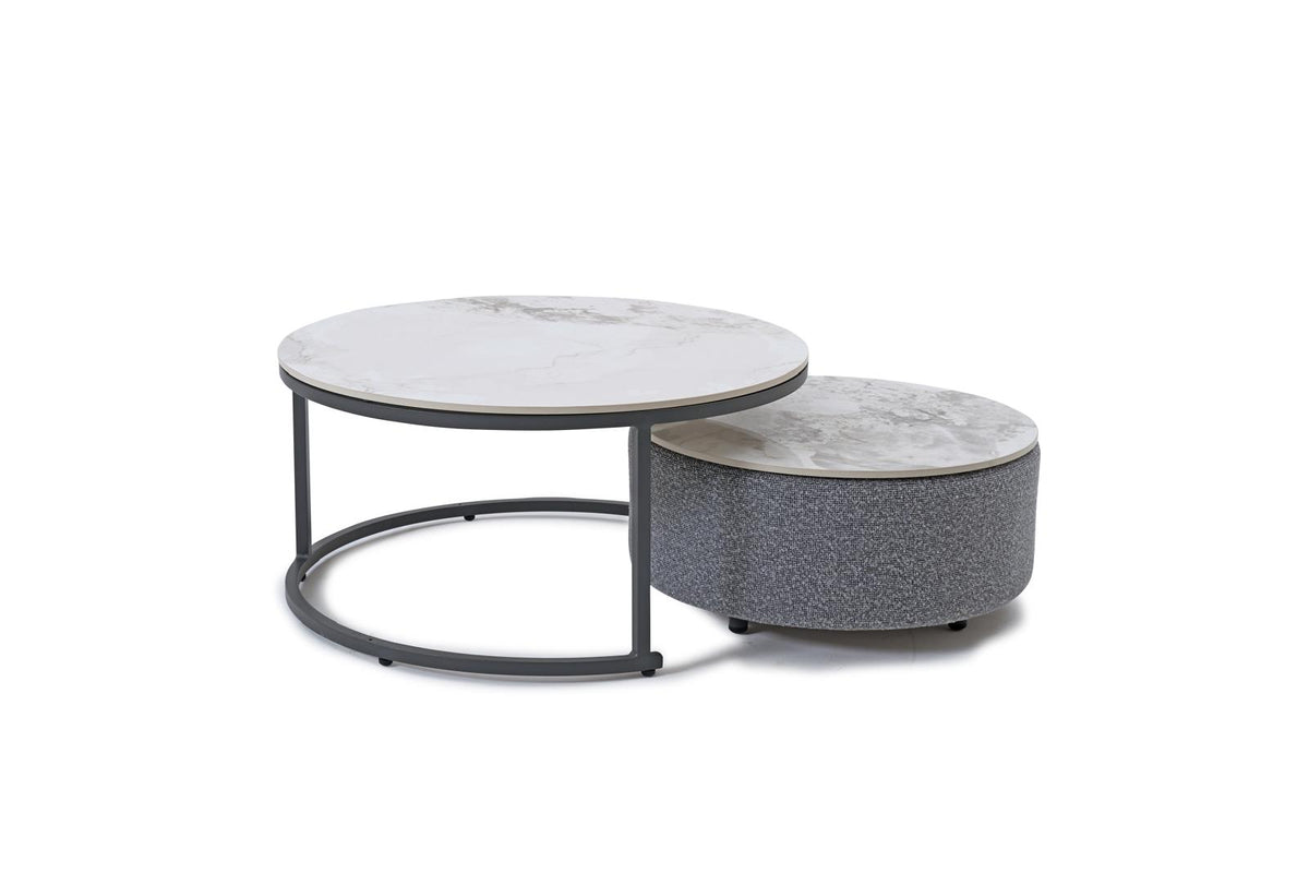 Outdoor round coffee table with marble-look top and gray ottoman-style side