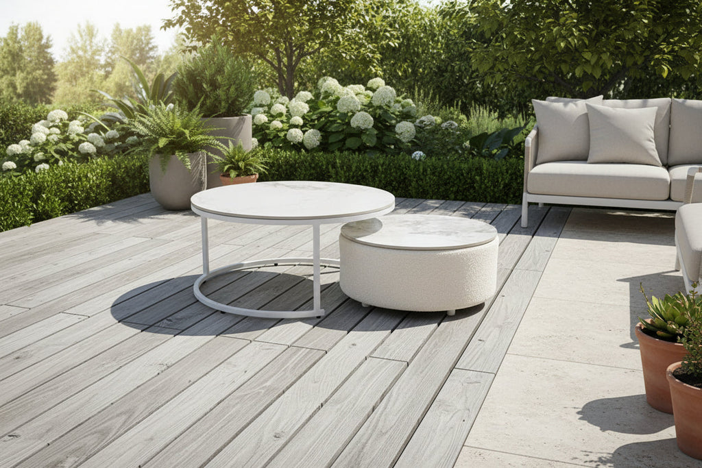 Outdoor round coffee table set with two white marble-look tops and gray metal frames